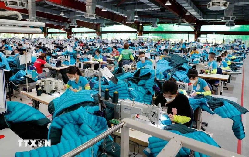 Garment production for exports to the US and the EU. (Photo: VNA)